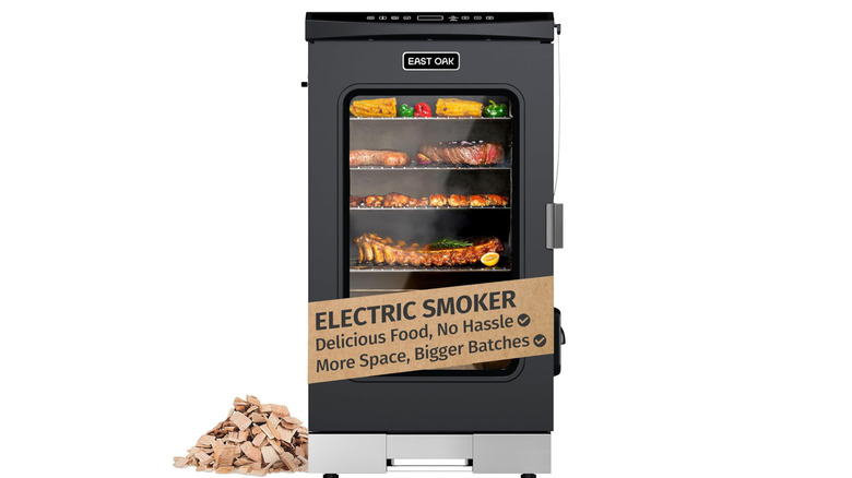vertical smoker with glass door full of food