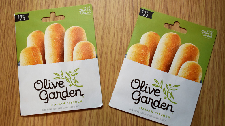 Two Olive Garden gift cards.