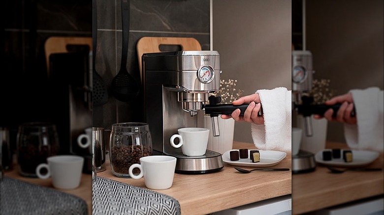 Woman using the Gevi Espresso Machine with Auto Milk Frother