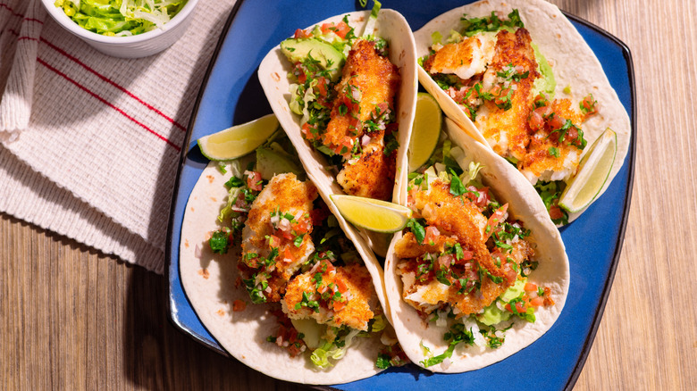 Fish tacos on blue plate