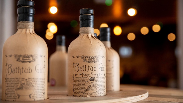 Bottles of Ableforth's Bathtub Gin on a wooden lazy Susan