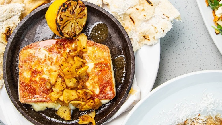 A plate of saganaki at Manoli's