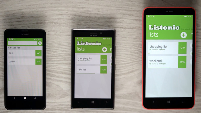 Three phones with Listonic app open