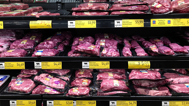 Packages of beef on shelves at Aldi