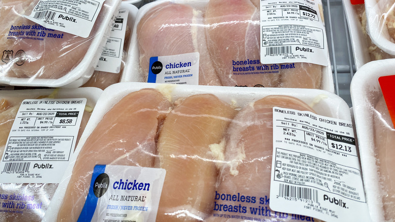 Packages of chicken breasts in a Publix meat department