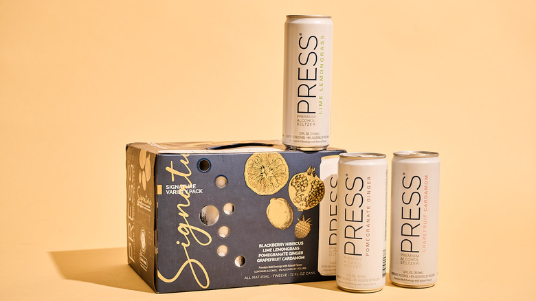 Press hard seltzers on a table