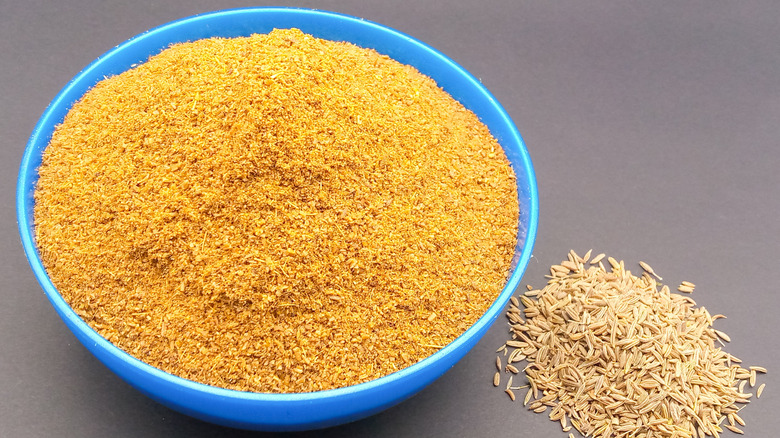 Cumin in a blue bowl