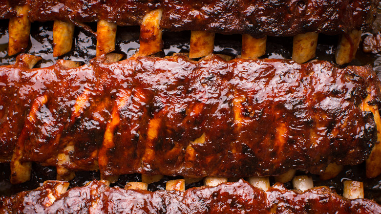 Close-up of barbecue pork ribs slathered in sauce