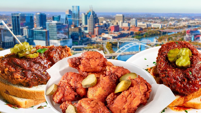 Variety of Nashville hot chicken plates in front of city skyline