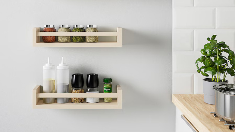 Spice racks mounted on wall in kitchen