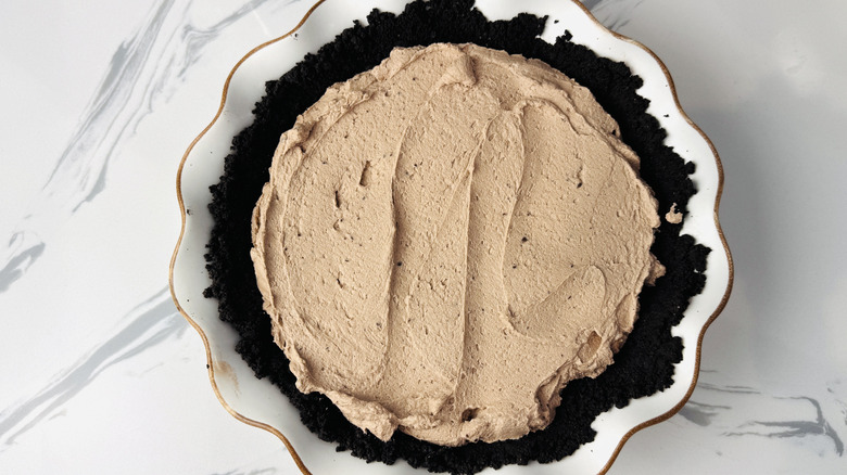 chocolate cream pie with a chocolate crumb crust