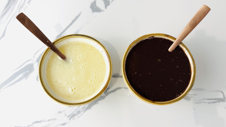 bowls of brown and white cream filling