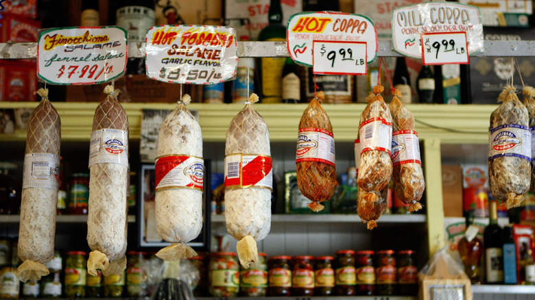 Cured meats hanging at an Italian deli in the San Francisco