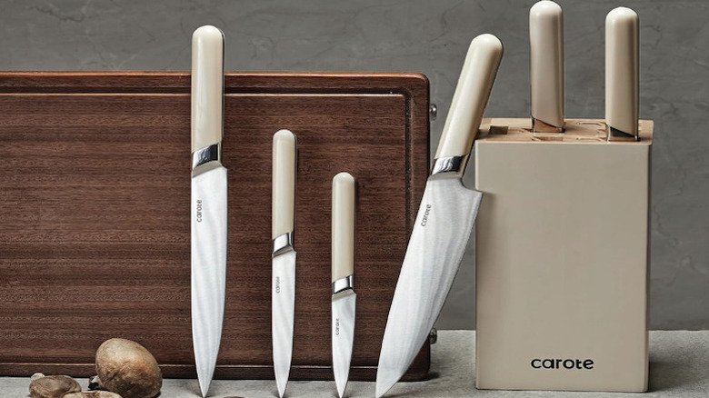 knives standing up against board