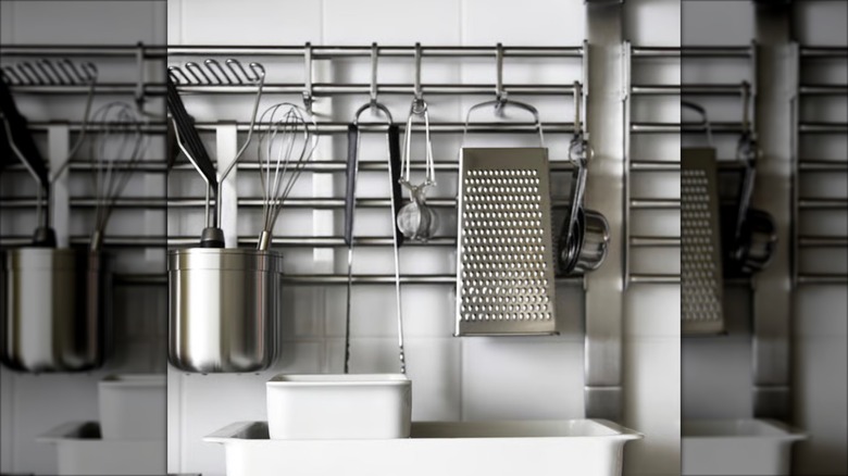 KUNGSFORS wire rack holding various kitchen tools