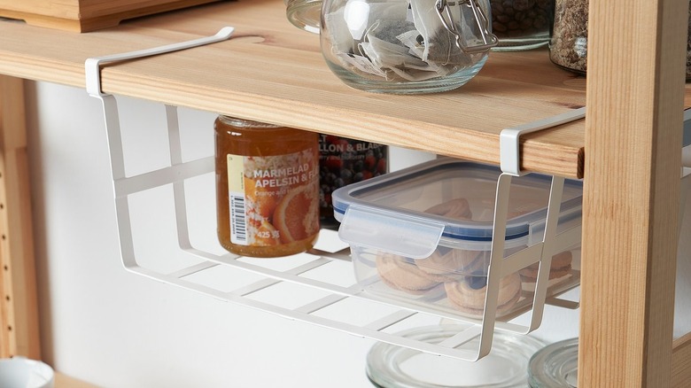 PÅLYCKE basket holding various kitchen items