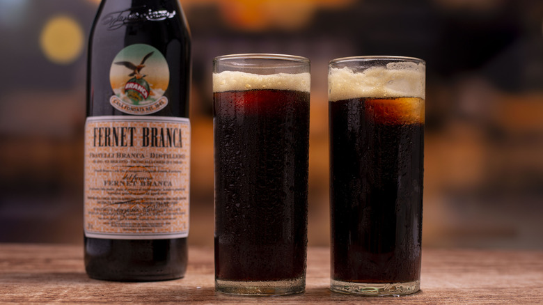 Dark Fernet Branca cocktails with a bottle