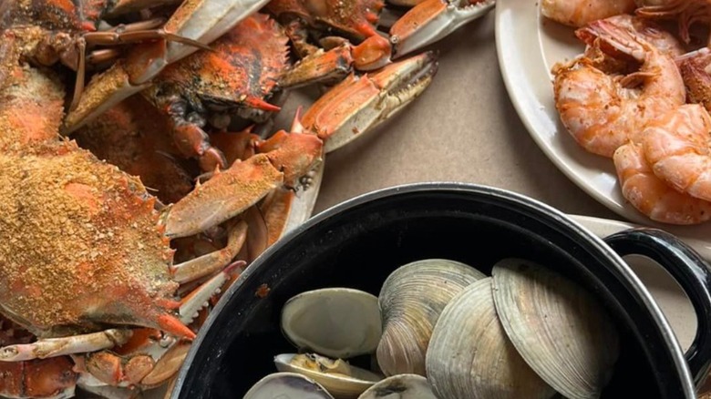 Platters of steamed crabs, steamed shrimp, and steamed clams