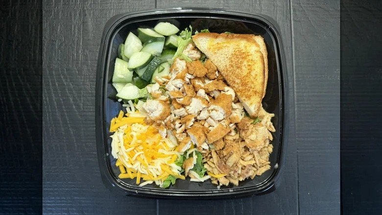 Zaxby's House Zalad packaged in a black to-go container