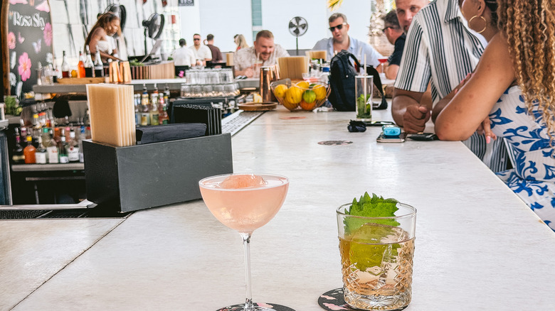 Drinks at Rosa Sky with bar in background