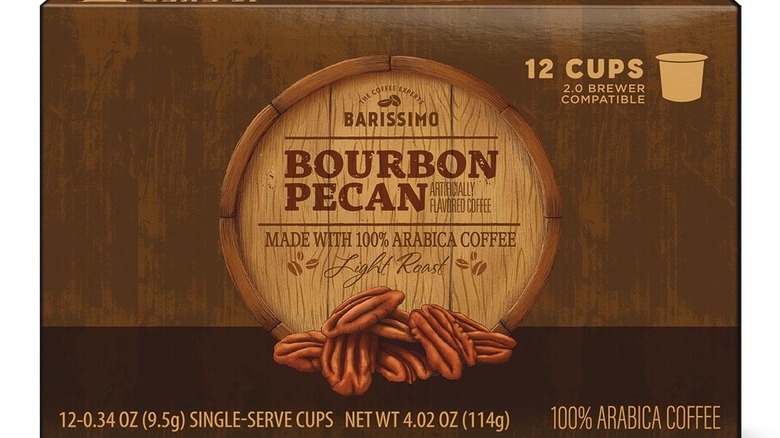 A brown boxed package of Bourbon Pecan Coffee with an illustration of coffee beans.