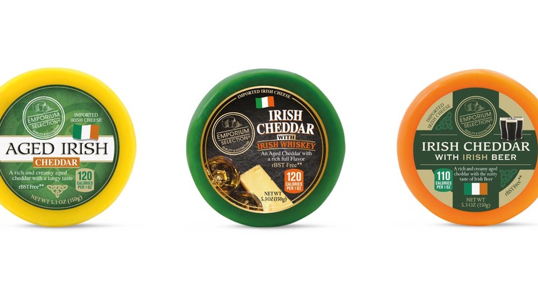 Three round blocks of Irish cheddar.