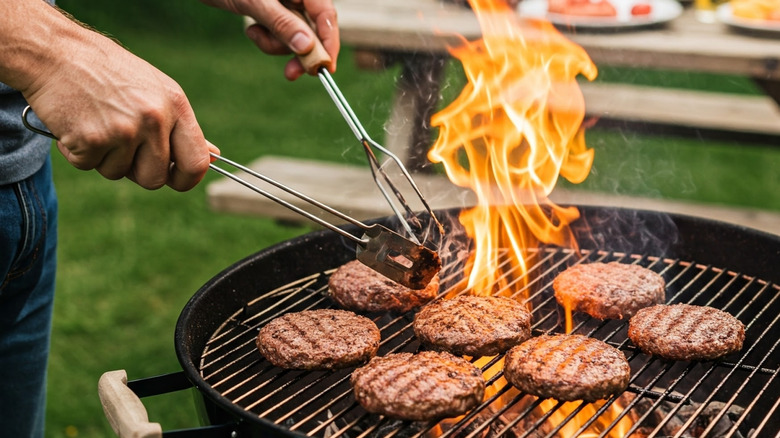 Burgers on a grill at a summertime barbecue