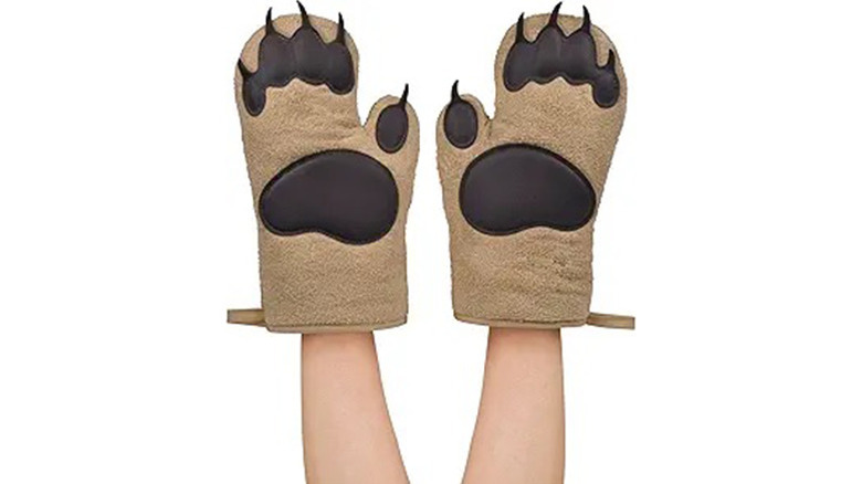 A pair of Fred & Friends Oven Mitt Bear Hands
