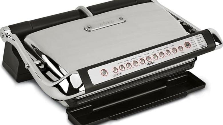 A panini press shows multiple settings on the front.