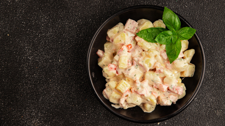 Potato salad with chunks of spam