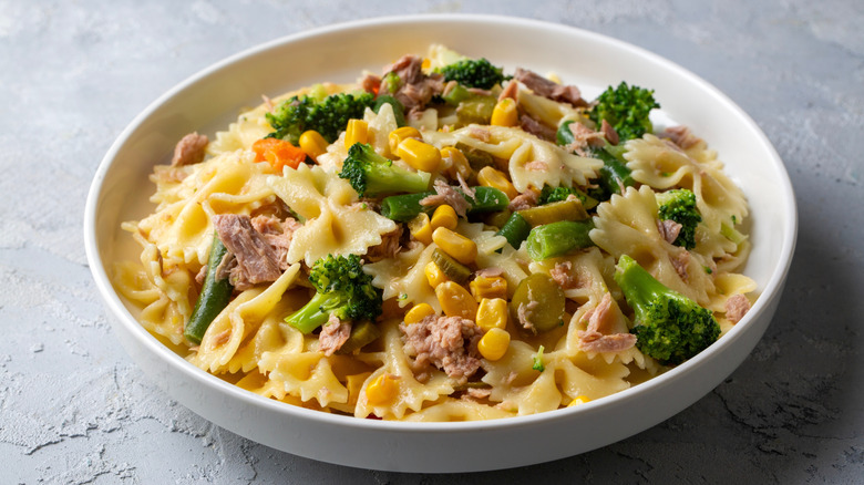 Pasta salad in a bowl with broccoli