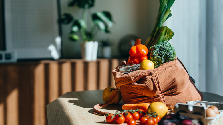 Table with reusable grocery bag