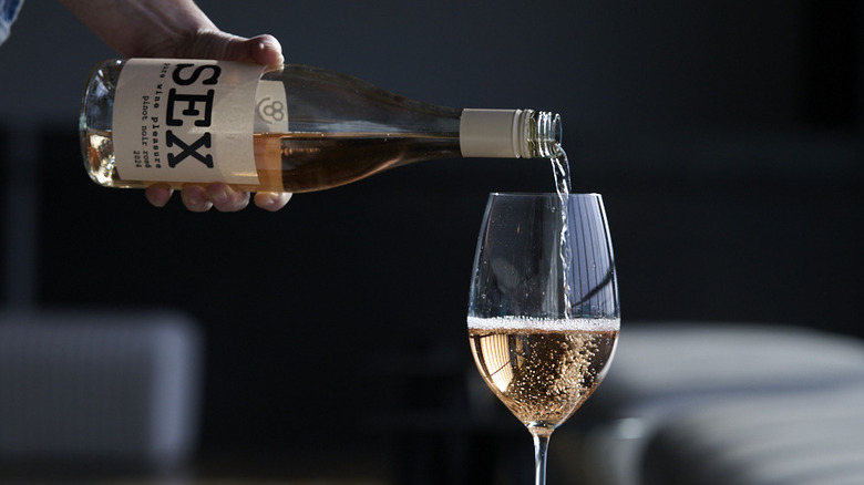 Bottle of SEX Rosé and glass
