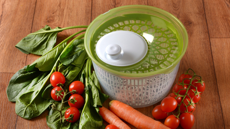 salad spinner near vegetables