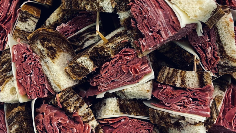 A pile of reuben sandwiches