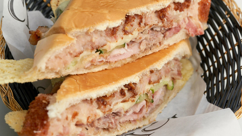 A Cubano sandwich in a basket