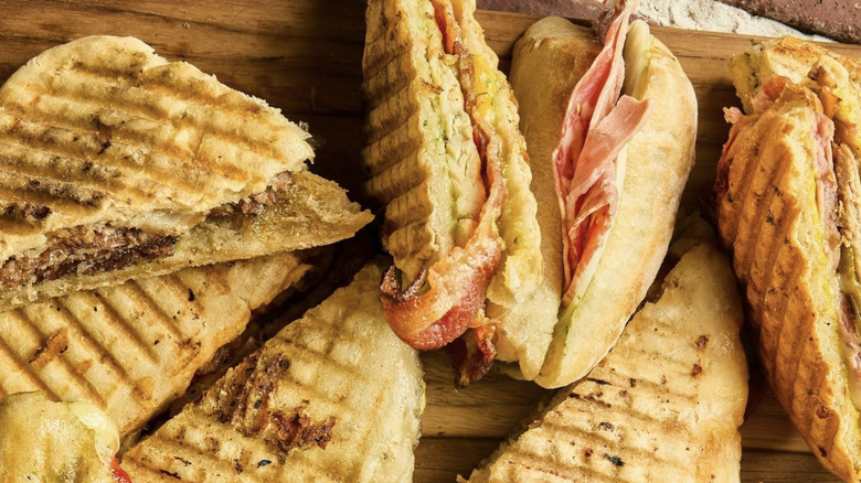 Paninis on a wooden tabletop