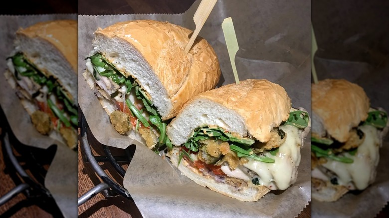 A spicy chicken sandwich in a basket