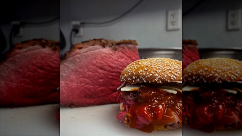 A bbq sandwich and a cut of beef
