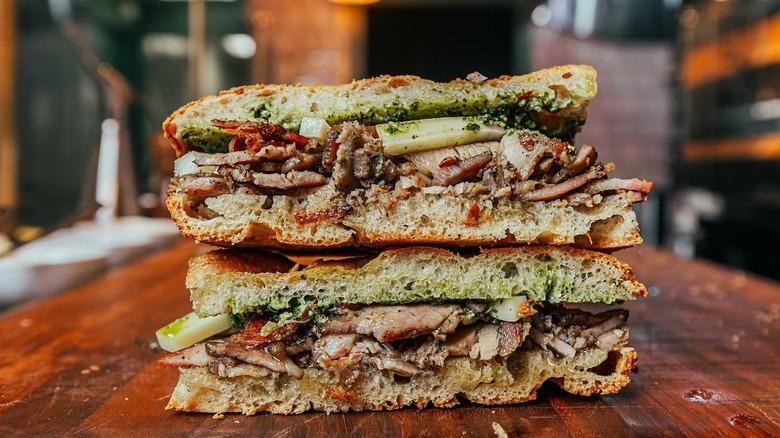 A panini on a wooden counter