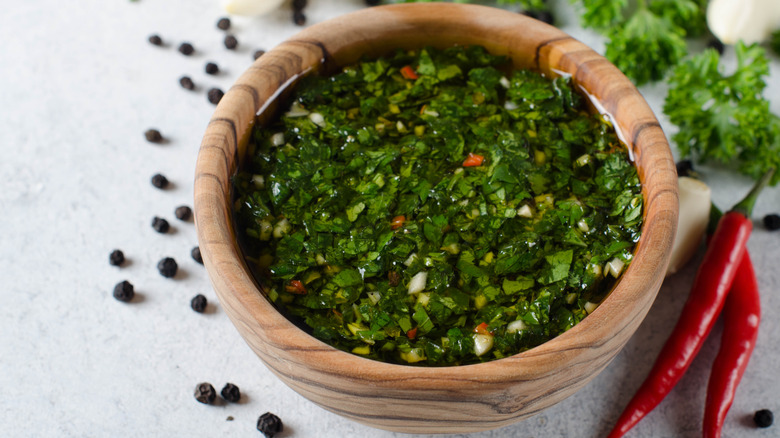 Bowl of chimichurri with chiles