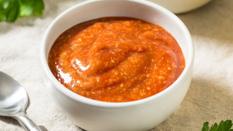Spicy cocktail sauce in a white dish