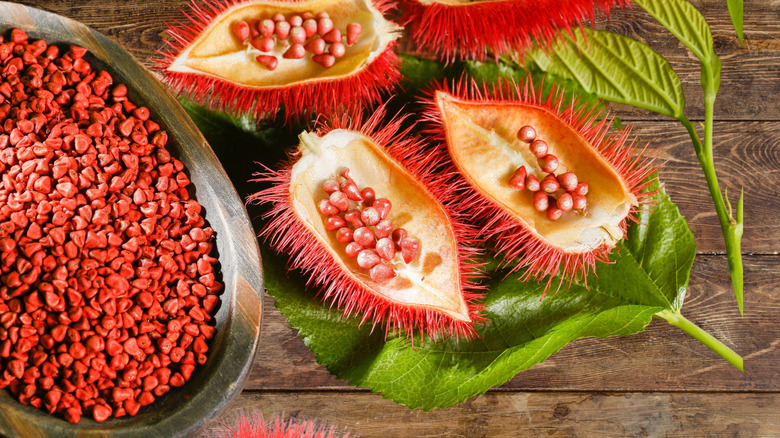 Achiote seeds on a wooden table