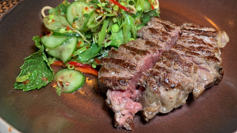 A sliced steak at Matu