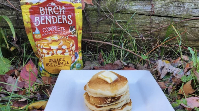 Birch Benders pancake mix next to a stack of pancakes