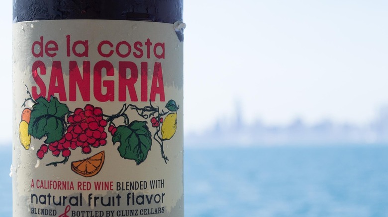 A closeup of a label of De La Costa sangria
