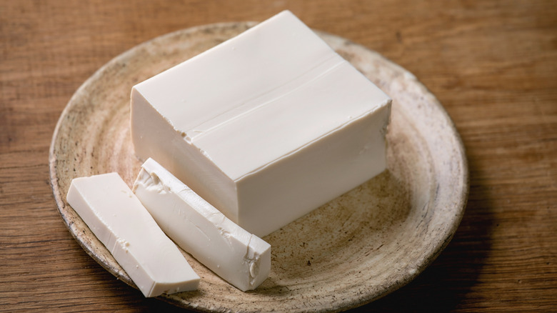 Silken tofu on wood board