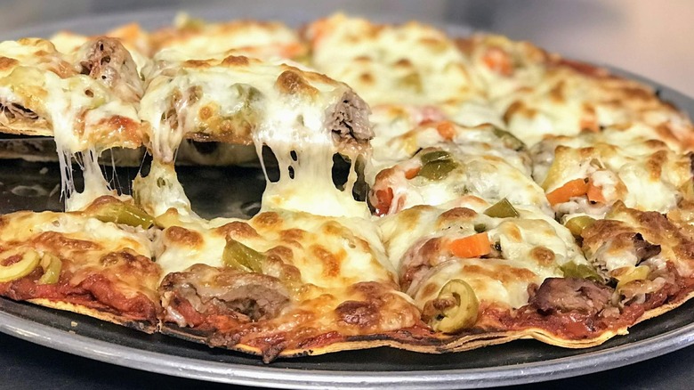 Pat's Pizza tavern-style pizza topped with Italian beef and giardinera