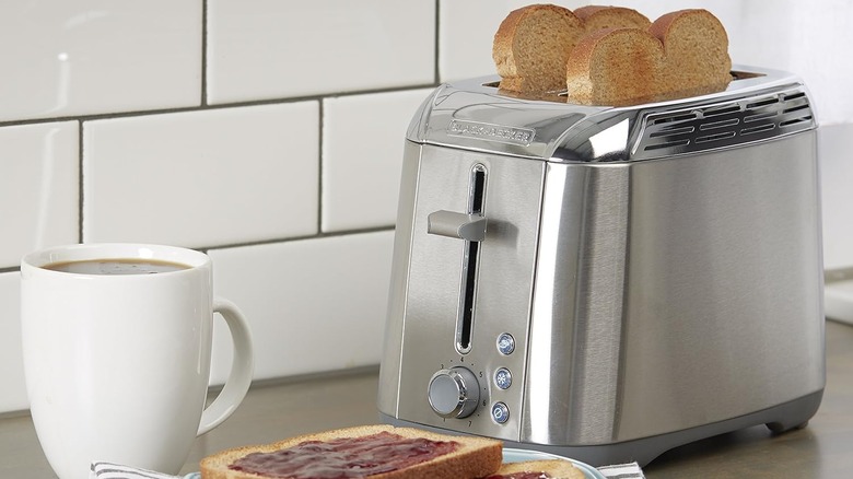 Product image of Black + Decker Rapid Toast next to some toast and coffee