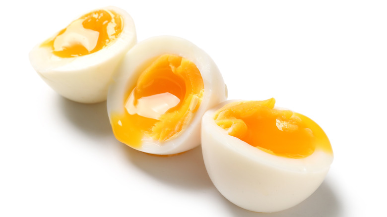 Halved soft-boiled eggs